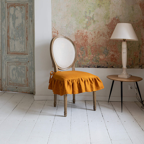 Our amber yellow linen slipcovers offer both practicality and aesthetic appeal. The covers will protect dining chairs from spills and stains, also enhance the visual appeal of your space with their timeless natural style. Slipcovers will simply change your chairs' appearance and provide an elegant solution.