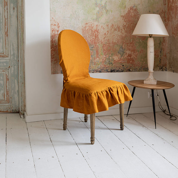 Our amber yellow linen slipcovers offer both practicality and aesthetic appeal. The covers will protect dining chairs from spills and stains, also enhance the visual appeal of your space with their timeless natural style.