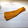 Our amber yellow linen curtain tie-back is the perfect solution for keeping your curtains looking neat and stylish. Made from the highest-quality European linen, they offer durability and a luxurious feel.