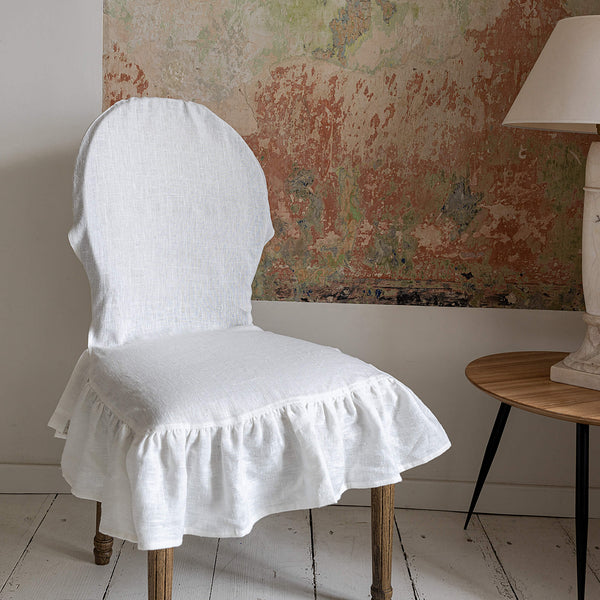 Our Antique white linen slipcovers offer both practicality and aesthetic appeal. The covers will protect dining chairs from spills and stains, also enhance the visual appeal of your space with their timeless natural style.