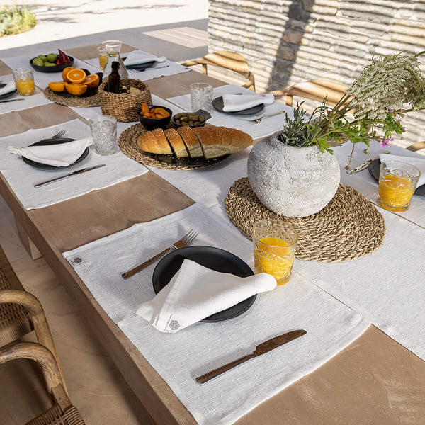 Introducing our antique white linen napkins set, designed to elevate your dining experience with a touch of warmth and charm. Crafted with care, these napkins are the perfect companions for your culinary adventures.