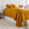 The amber yellow linen bedspread has been carefully designed to suit a wide range of interior styles and blend perfectly in both classic and contemporary home spaces. Our linen bedspreads are extremely versatile and complementing different the of interiors perfectly, adding new colours and emotions.