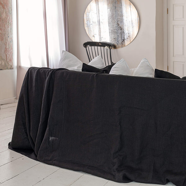 Choosing black colour for your sofa not only offers protection but also brings a timeless elegance, natural linen covers can enhance the aesthetic of your living space while ensuring long-lasting protection for your furniture.