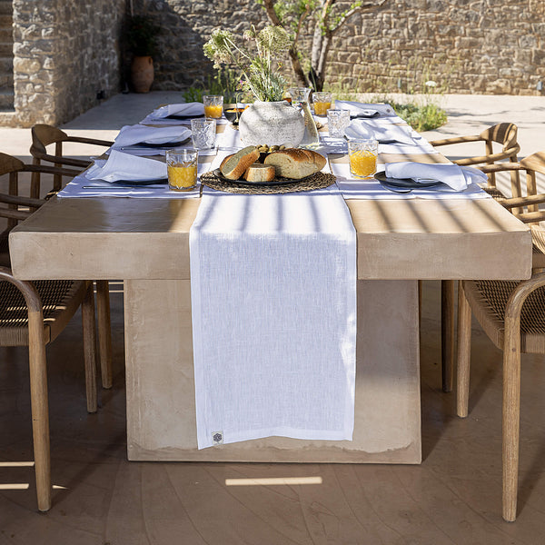 Give your table a touch of distinction and decoration with our bright white linen table runner. Use the table runner on its own or combine it with a linen tablecloth, placemats or napkins.