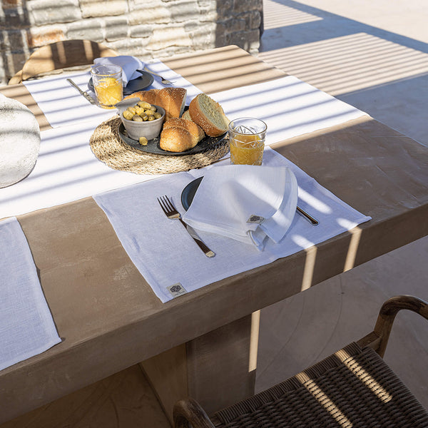 Discover The Linen Valley's optical white linen placemats, which combines everyday luxury with sustainable elegance, where natural linen completely transforms and enhances your table setting.