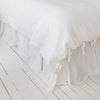 Present our luxurious bright white linen duvet cover set, designed to elevate both the aesthetic appeal and comfort level of your bedroom. Our linen duvet covers are made from a single, wide fabric, eliminating any unsightly seams in the middle.