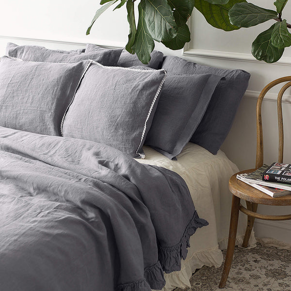 Our linen charcoal grey duvet cover with ruffles has an unmistakable classic French rustic style and a timeless design that never gets old and is always relevant. This cover allows you to enjoy all the best qualities of natural linen.