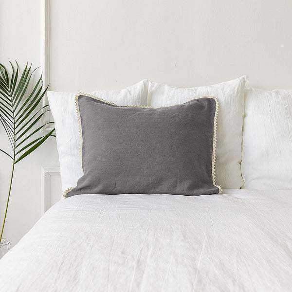 Our charcoal grey linen pillowcases will add a touch of elegance and style to your bedroom.