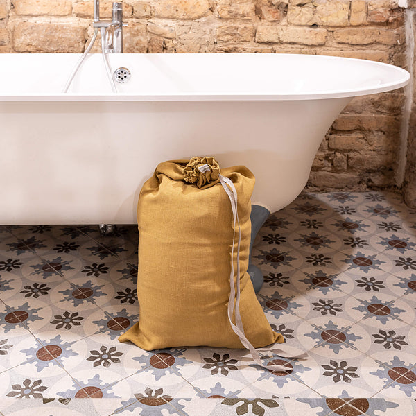 Introducing our dusty mustard linen laundry bag, the ultimate solution for keeping your laundry organised in style.