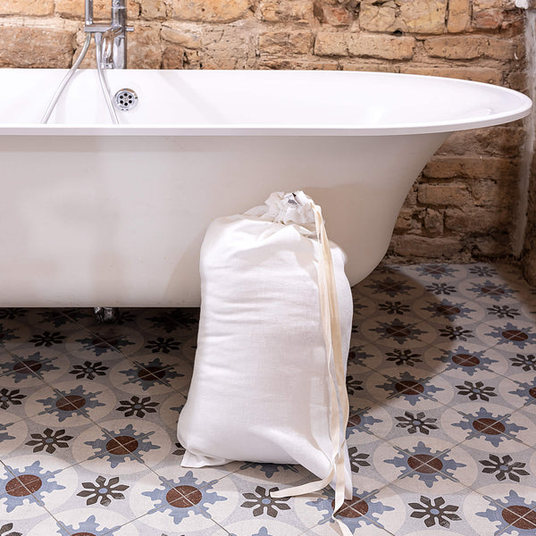 Introducing our optical white linen laundry bag, the ultimate solution for keeping your laundry organised in style.