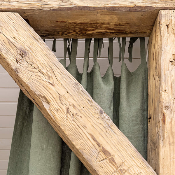 Our moss green tie top linen curtains are designed and made to give your home unique and timeless charm. Linen curtains would complement interiors from minimalistic, Scandinavian or modern to Mediterranean or classical style.