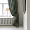 Our moss green linen curtain tie-back is the perfect solution for keeping your curtains looking neat and stylish. Made from the highest-quality European linen, they offer durability and a luxurious feel.