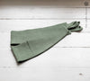 Our moss green linen curtain tie-back the perfect solution to keeping your curtains looking neat and stylish.