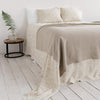Rustic linen throw crafted from a softened natural linen, adds a warmth and style to any bedroom decor.Whether you choose to drape it as a bed throw or wrap yourself in its soft embrace on chilly evenings, this versatile blanket offers both functionality and elegance.