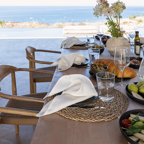 Introducing our off white linen napkins set, designed to elevate your dining experience with a touch of warmth and charm.