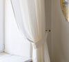 Our off white linen curtain tie-back the perfect solution to keeping your curtains looking neat and stylish.