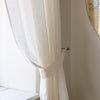 Our off white linen curtain tie-back is the perfect solution for keeping your curtains looking neat and stylish. Made from the highest-quality European linen, they offer durability and a luxurious feel.