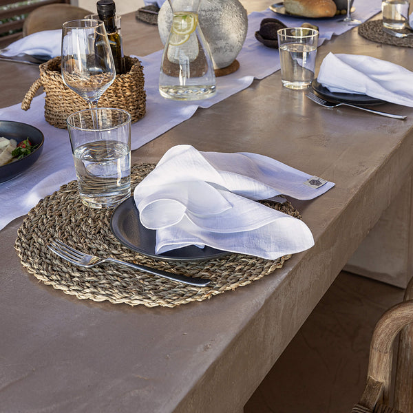 Introducing our optical white linen napkins set, designed to elevate your dining experience with a touch of warmth and charm. Crafted with care, these napkins are the perfect companions for your culinary adventures.