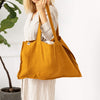 Amber yellow linen tote bags designed and made for long, comfortable and sustainable use.