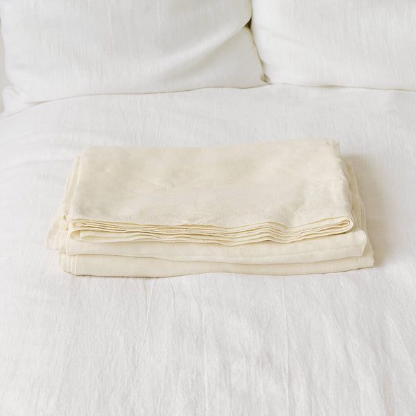 Linen flat sheet in off white colour. rafted with care, this flat sheet of your choice, providing you with everything you need for a blissful night's sleep.Versatile in function, our flat sheets can be used as top sheets for added warmth or as lightweight bedcovers during warmer nights.