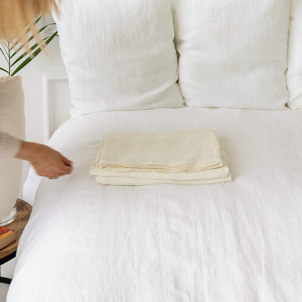 Linen flat sheet in off white colour. rafted with care, this flat sheet of your choice, providing you with everything you need for a blissful night's sleep.Versatile in function, our flat sheets can be used as top sheets for added warmth or as lightweight bedcovers during warmer nights.