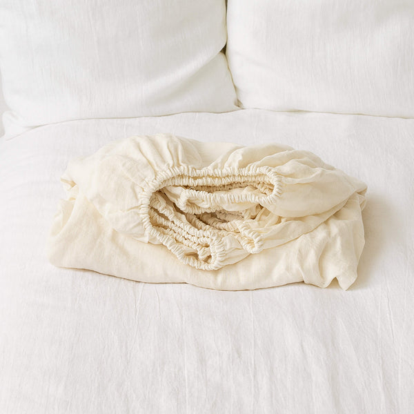 Our of white linen fitted sheet, designed and crafted from gentle and breathable linen, these sheets are destined to become a staple in your bedding collection.