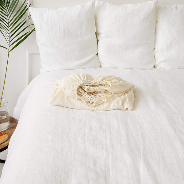 Our of white linen fitted sheet, designed and crafted from gentle and breathable linen, these sheets are destined to become a staple in your bedding collection.
