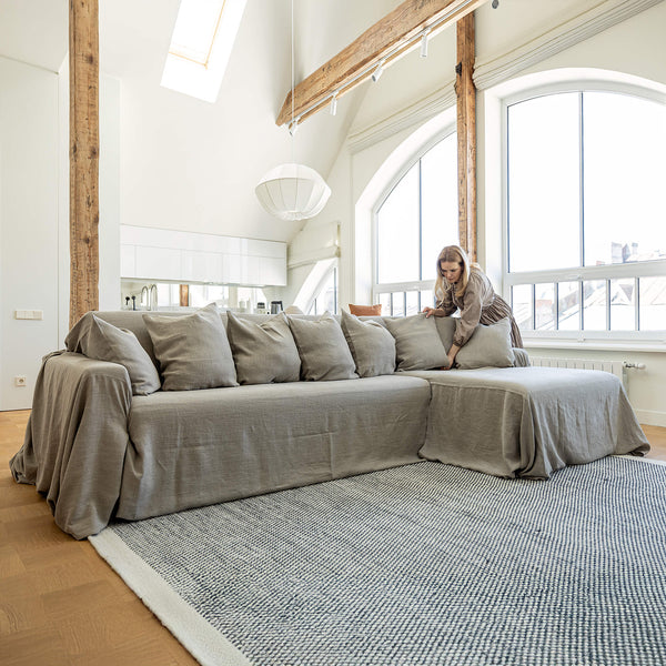Our rustic unbleached linen sectional couch cover a stylish way to change up the look of the room. Plus, linen has natural properties that make it resistant to stains and easy to clean, which adds to its appeal for everyday use.