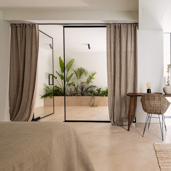 Lined rustic unbleached linen curtains with lining, designed and made to provide maximum protection from the sun and heat coming through the window.