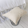 Our striped linen pillows will add a touch of elegance and style to your bedroom.