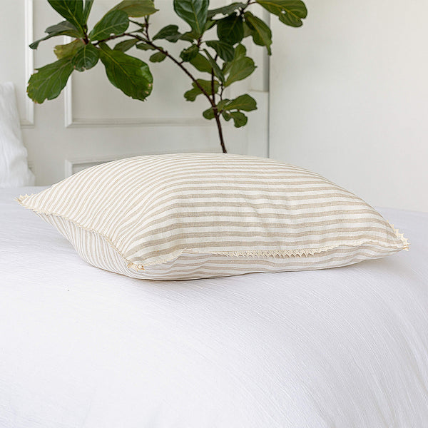 Our striped linen pillows will add a touch of elegance and style to your bedroom.