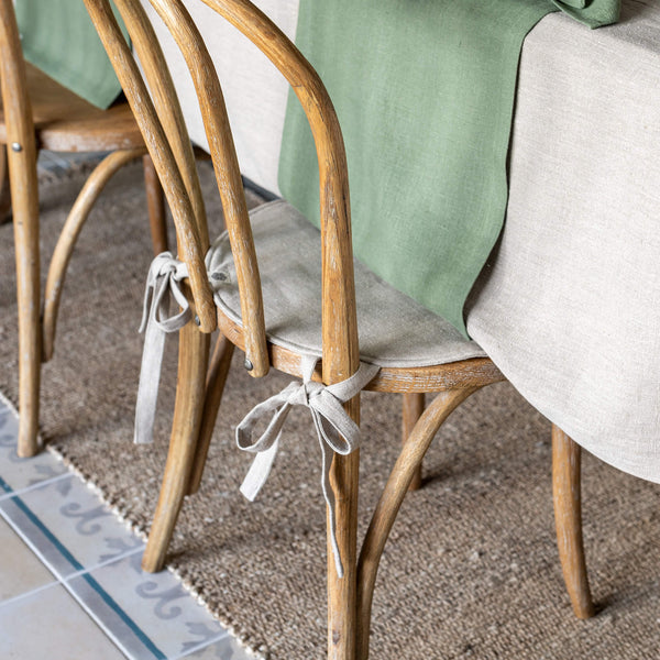 Say goodbye to worrying about stains or scratches, and hello to a beautifully refreshed chair that's both inviting and protected. Natural Linen chair cover with soft padding inside.