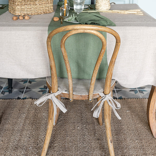Say goodbye to worrying about stains or scratches, and hello to a beautifully refreshed chair that's both inviting and protected. Natural Linen chair cover with soft padding inside.