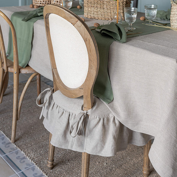 Our rustic unbleached linenslipcovers offer both practicality and aesthetic appeal. The covers will protect dining chairs from spills and stains, also enhance the visual appeal of your space with their timeless natural style. Slipcovers will simply change your chairs appearance and provide an elegant solution.