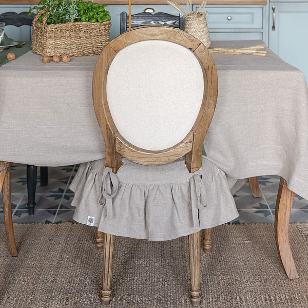 Our rustic unbleached linenslipcovers offer both practicality and aesthetic appeal. The covers will protect dining chairs from spills and stains, also enhance the visual appeal of your space with their timeless natural style. Slipcovers will simply change your chairs appearance and provide an elegant solution.