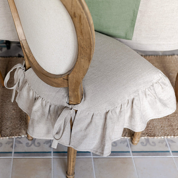 Our rustic unbleached linenslipcovers offer both practicality and aesthetic appeal. The covers will protect dining chairs from spills and stains, also enhance the visual appeal of your space with their timeless natural style. Slipcovers will simply change your chairs appearance and provide an elegant solution.