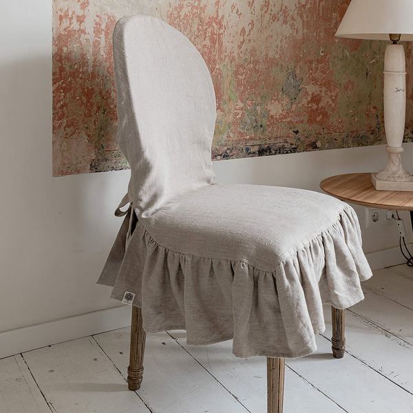 Our rustic unbleached linen slipcovers offer both practicality and aesthetic appeal. The covers will protect dining chairs from spills and stains, also enhance the visual appeal of your space with their timeless natural style.