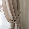 Our natural unbleached linen curtain tie-back is the perfect solution for keeping your curtains looking neat and stylish. Made from the highest-quality European linen, they offer durability and a luxurious feel.