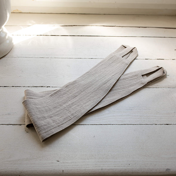 Our natural unbleached linen curtain tie-back is the perfect solution for keeping your curtains looking neat and stylish. Made from the highest-quality European linen, they offer durability and a luxurious feel.
