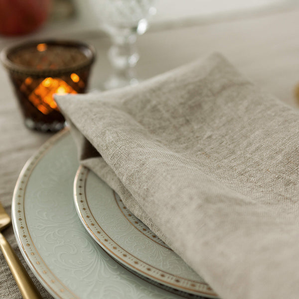 Introducing our unbleached linen napkins set, designed to elevate your dining experience with a touch of warmth and charm.
