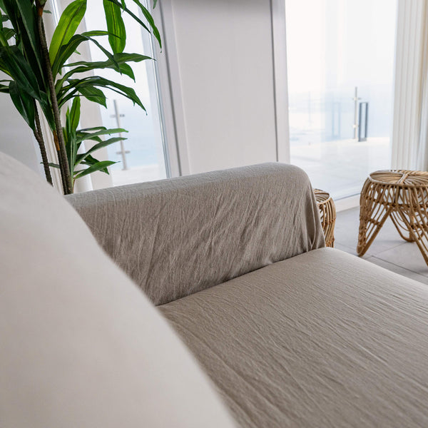 This natural linen cover enhance your decor, but it also serves as a shield against the playful antics of your beloved pets, safeguarding your couch from any potential damage.