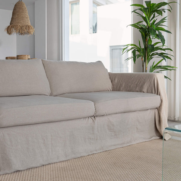 This natural linen cover enhance your decor, but it also serves as a shield against the playful antics of your beloved pets, safeguarding your couch from any potential damage.