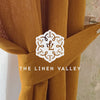Our amber yellow linen curtain tie-back is the perfect solution for keeping your curtains looking neat and stylish. Made from  the highest-quality European linen, they offer durability and a luxurious feel.
