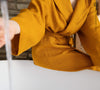 Immerse yourself in our amber yellow natural linen bathrobe and enjoy the exceptional comfort and elegance and breathability of natural linen.