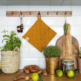 The linen pot holder come in a variety of pastel and rich colours, which are a perfect match for our other home textiles.