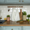 Antique white tea towels made of natural linen are durable, making them the ideal companions for your daily culinary adventures. Carefully crafted, our linen tea towels are not only practical but also add colour and sophistication to your kitchen.