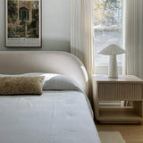 Bright white linen bedspread designed to infuse your bed with an extra touch of uniqueness, coziness and charm. Draped elegantly over your bed as a bedspread or wrapped snugly around you on chilly nights, it's versatile enough to suit your needs.