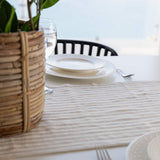 Crafted with care, this runner adds a touch of distinction and sophistication to any dining experience. The subtle yet refined design lends versatility, making it suitable for both casual gatherings and formal occasions.
