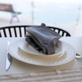 Introducing our charcoal grey linen napkins set, designed to elevate your dining experience with a touch of warmth and charm. Crafted with care, these napkins are the perfect companions for your culinary adventures.