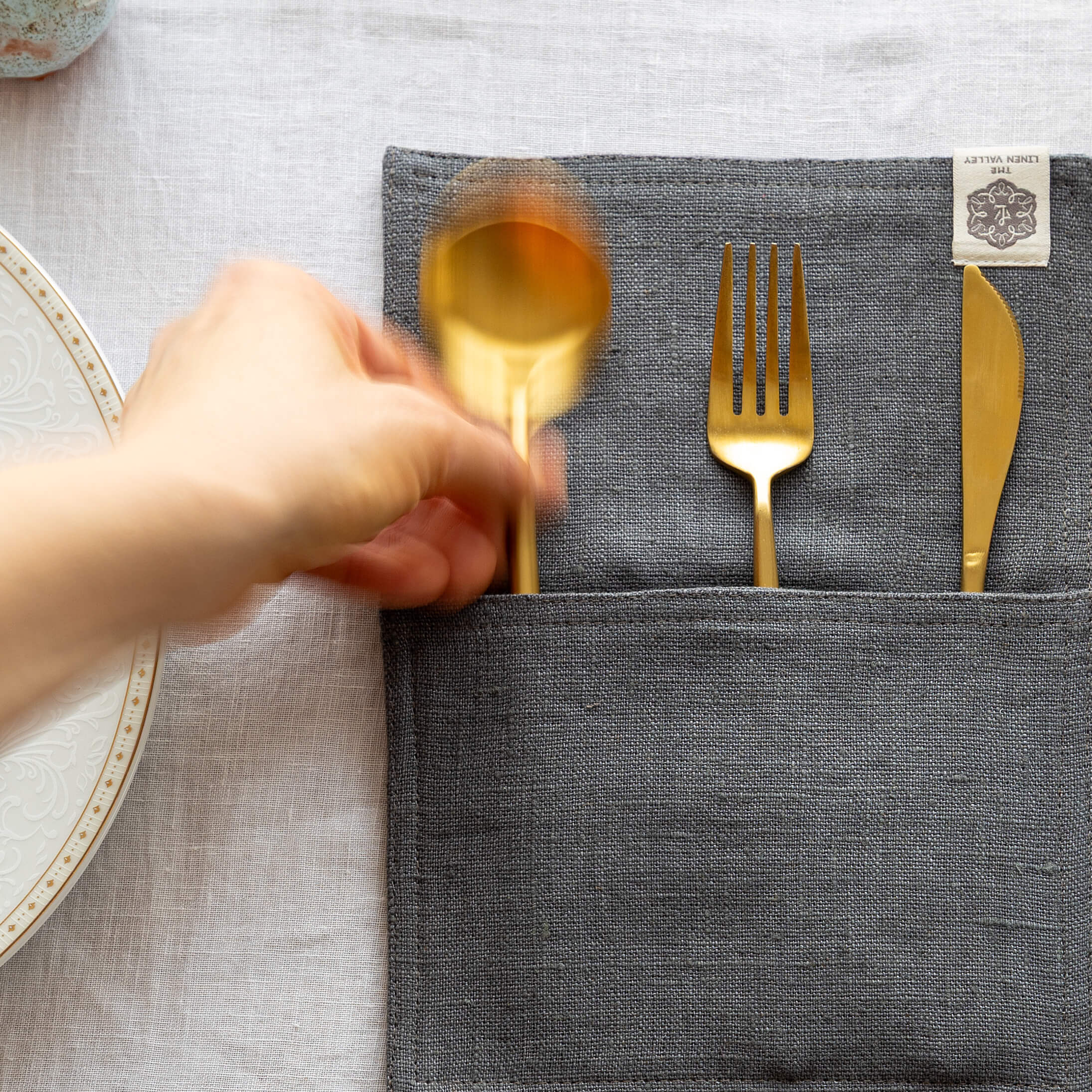 Charcoal grey linen cutlery holder will make your table setting look neat and tidy. Decorative cutlery pouch can be paired with table napkins or other table linens, mixed or matched.